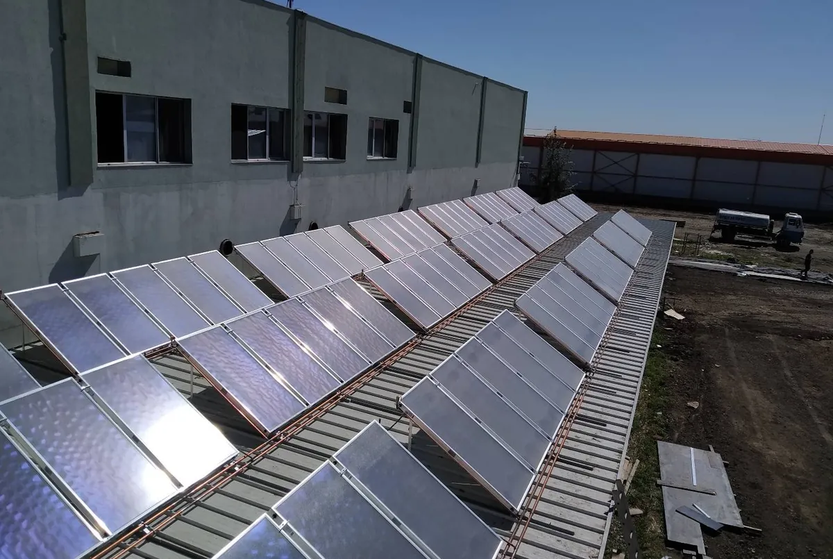 One hundred ELSOL solar collectors on the roof of an industrial building